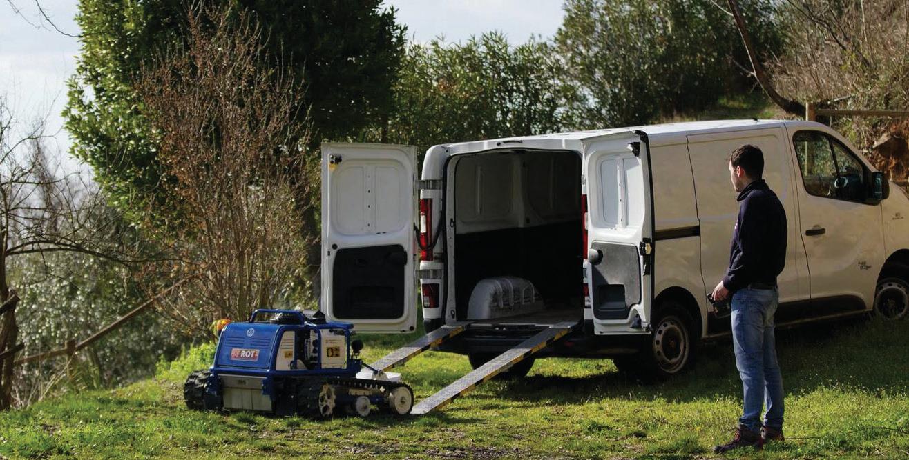 TracMow being loaded for transport